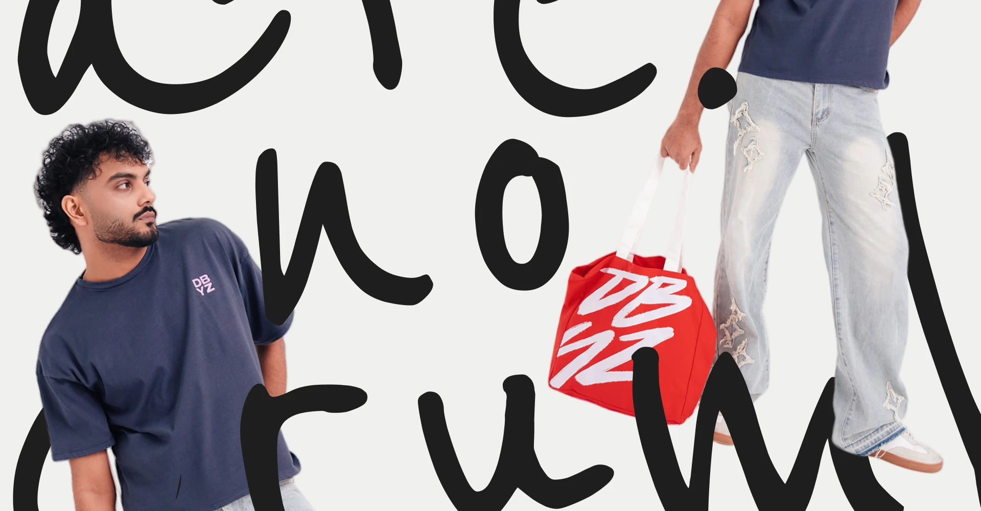 DBYZ campaign: model in a washed navy tee with a red DBYZ tote bag, with handwritten lettering